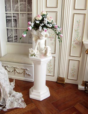 Cherub on pillar